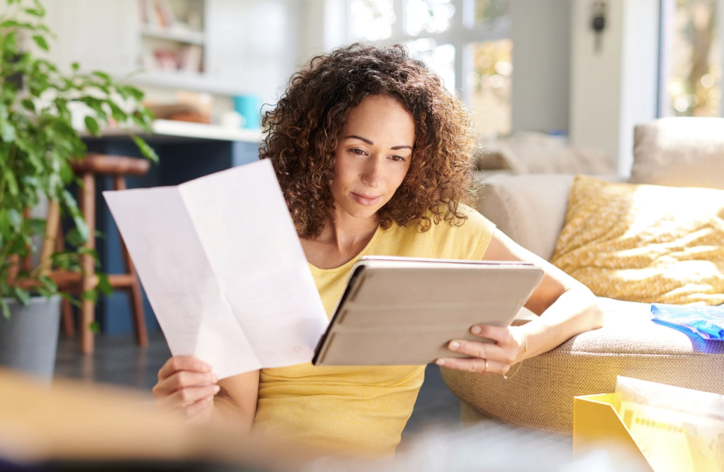 Woman doing multiple research about local real estate agents to help her